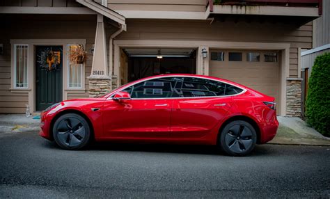 tesla frameless windows